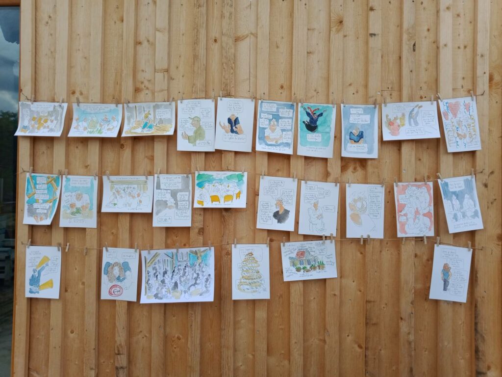 Illustrations hanging on wall . photo Elona Hoover